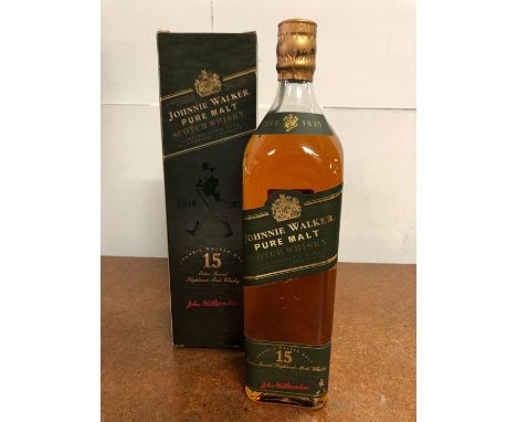A Bottle of Green Label Johnnie Walker Pure Malt Scotch Whisky