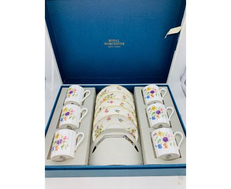 A boxed Royal Worcester six coffee cups and saucers AF