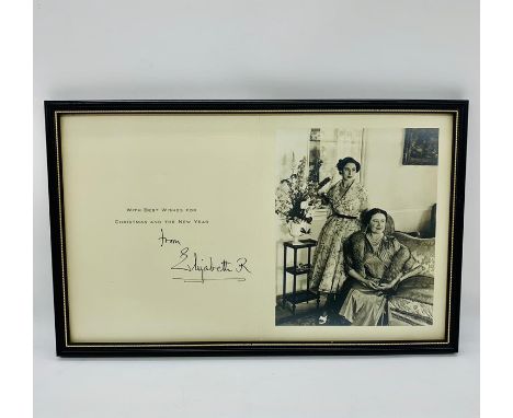 A Christmas Card signed Elizabeth R featuring a photograph of Princess Margaret and the Queen Mother.(Framed)