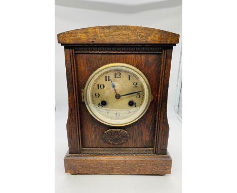 Wooden cased mantle clock