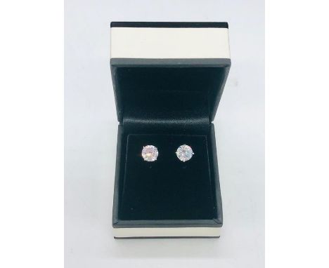 A pair of silver substantial cz stud earrings of 4ct's approx. 