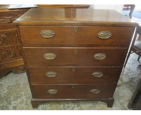A 19th century oak chest of four long drawers on bracket feet, 102cm h x 93cm w 