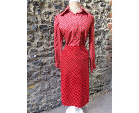 A 1960's Christian Dior 'Diorling' 2 piece ladies outfit comprising a skirt 24" waist x 28" long and a blouse 32/34" chest, i