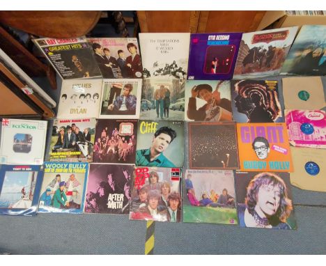 A mixed collection of vinyl records to include The Rolling Stones, Bob Dylan, Cliff Richard, Hollies, The Kinks, Manfred Mann