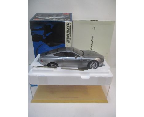 A Kyosho die cast James Bond Aston Martin V12 Vanquish 1:12 scale model with certificate, plaques, Perspex and wooden case, a