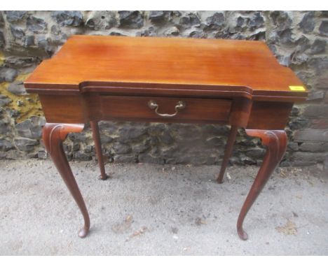 An early 20th century mahogany fold over card table with single inset drawerLocation: BWR 