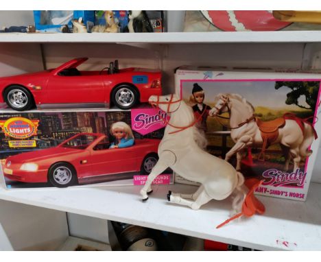 A boxed Sindy red light and sound car and a boxed Sindys horse Tiffany 
