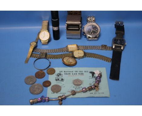 A COLLECTION OF WRIST WATCHES, SMALL QUANTITY OF COINS, SILVER CHARM BRACELET ETC.