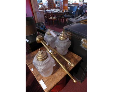 A set of three frosted glass light shades in the classical taste together with two wall light fittings