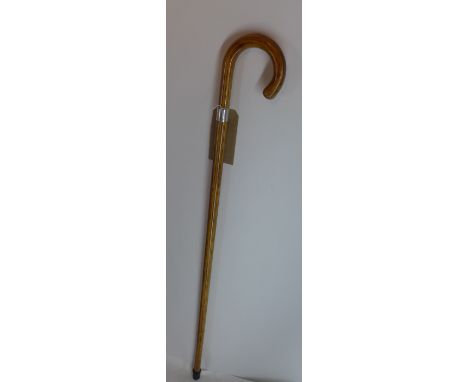 A walking stick with a hallmarked silver collar