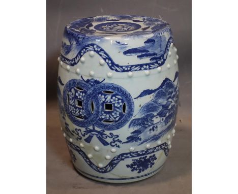 A 19th century Chinese blue and white porcelain garden barrel stool, decorated with mountainous scenes, heavily restored, H.4