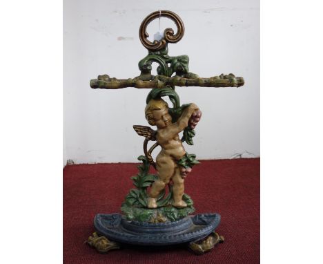 A painted cast iron stick stand, H.67cm 