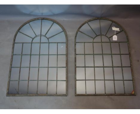 A pair of contemporary arched garden mirrors, 78 x 49cm 