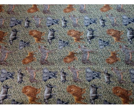 A modern reversible patchwork throw, one side with panels of African animals and Tribal print, the other with African animals