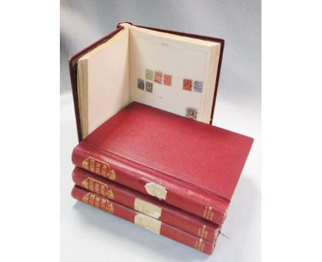 Four early 20th century stamp albums, containing World & GB  