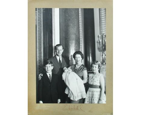 HM Queen Elizabeth II, a black & white photograph of Her Majesty and other members of the Royal family, signed Elizabeth R 19