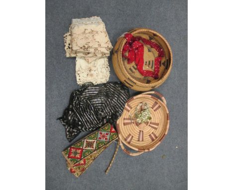 A collection of North American baskets, lace, and tapestry bell pulls  