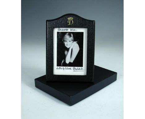 HRH Diana, Princess of Wales, a signed portrait black and white photograph, inscribed in ink 'Dearest Ian, lots of love, Dian
