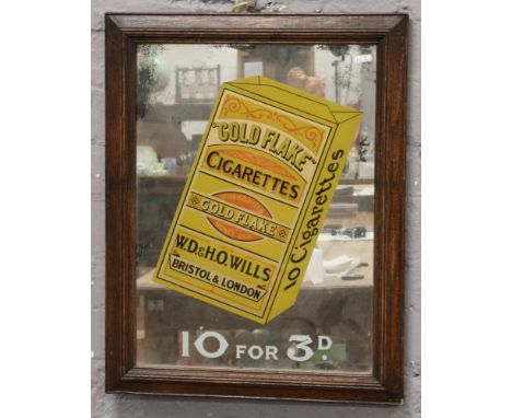 A vintage advertising mirror for Gold Flake cigarettes carved oak frame, 58.5cm x 46cm. 