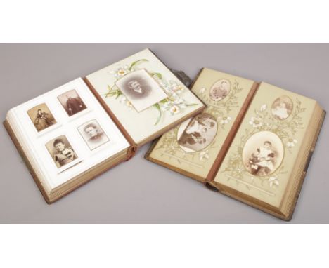A Victorian photograph album with contents of portrait photographs. 