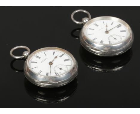 Two Victorian silver Waltham pocket watches, both with enamel dials and Roman numeral markers. 