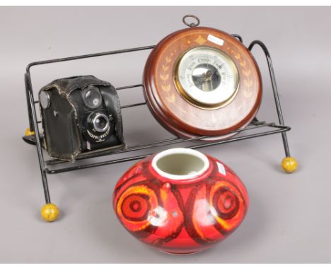 A marquetry barometer atomic 1960 record / book stand and a Poole vase. 