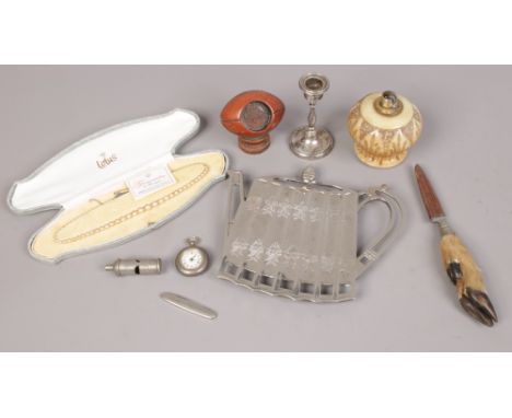 A group lot of collectables to include silver candlestick, simulated pearls, LNER whistle etc. 