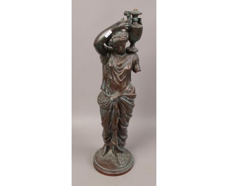 A bronze figural statue / lamp base of a classical maiden. 