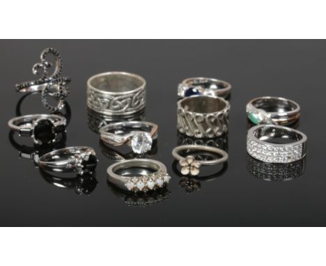 A Pandora dress ring and ten other silver rings including opal set example. 