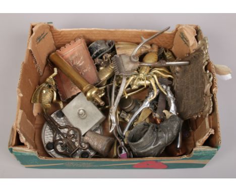 A box of miscellaneous metalwares to include nutcracker, spider trinket box, vintage scissors etc. 