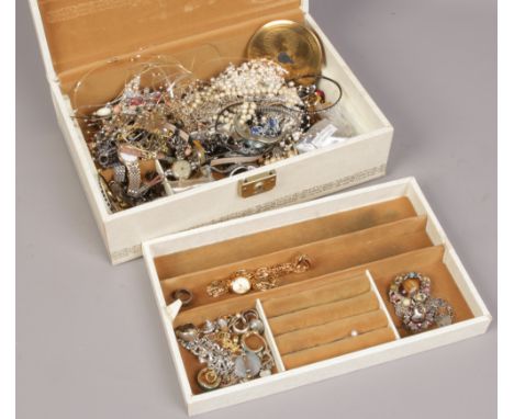 A jewellery box and contents of costume jewellery to include silver examples, manual wristwatches, brooches etc. 