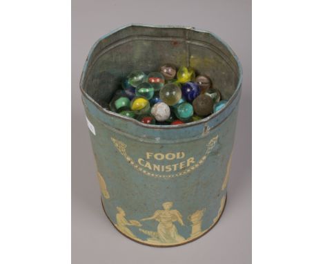 A collection of vintage / unusual marbles in metal tin. 