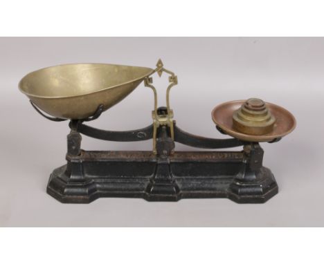 A set of W &amp; T Avery cast iron and brass scales with Avery weights. 