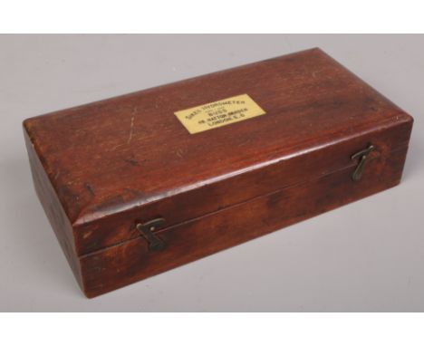 A vintage wooden cased Sikes hydrometer by Buss London. 