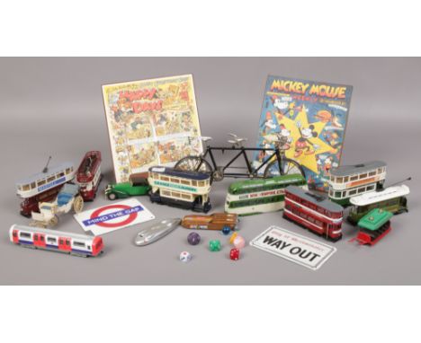 A collection of mainly Corgi Diecast trams to include model tandem bicycle, city of Westminster metal plaque, Mickey Mouse we