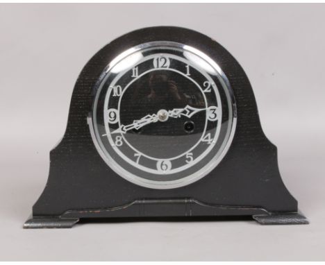 An enfield 8 day mantle clock striking on a gong. 