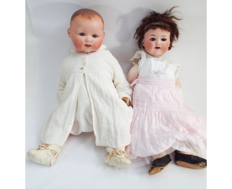 Two large bisque head dolls, baby doll AM351/9k (head in good condition) and A11M Germany 990 head (hair lined)