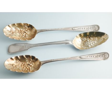 Pair of Georgian silver table berry spoons, with gilded bowls, London 1802, and a Victorian silver berry spoon. Gross weight 