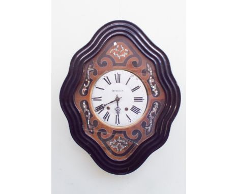 Shaped white circular dial striking wall clock with mother of pearl mounts in the frame