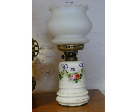 Floral decorated porcelain oil lamp with glass bowl shade 