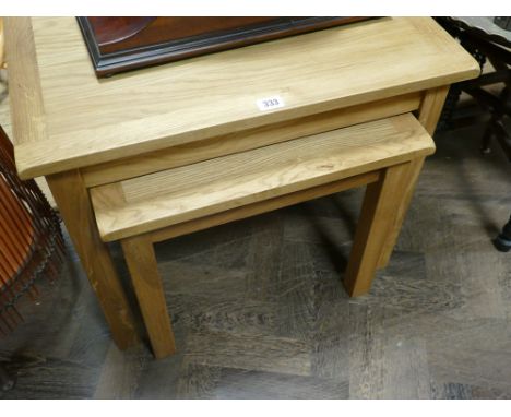 A new light oak nest of 2 heavy oak coffee tables