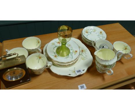 Staffordshire daffodil decorated tea set, carriage type mantle clock, wine glass etc.