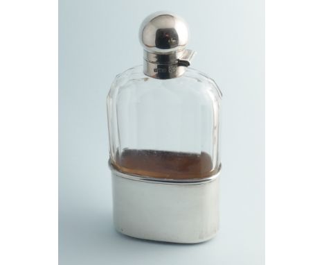 Silver and cut glass spirit hip flask, silver mounts hallmarked Sheffield 1915.  No obvious sign of damage or repair