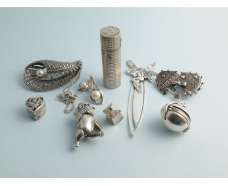 A collection of small silver ware - bookmark, pendants and a silver and marcasite leaf shaped brooch set with cultured pearl