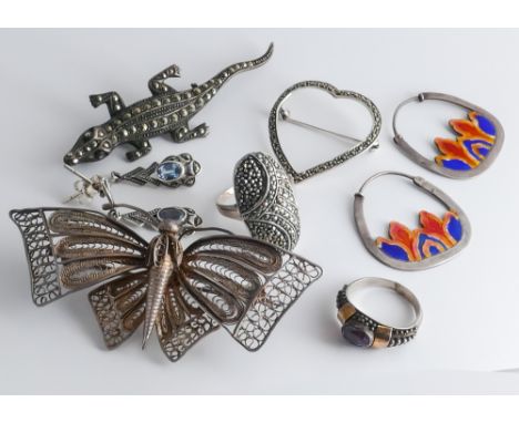 Collection of silver items to include marcasite brooches, enamel earrings, butterfly brooch etc.