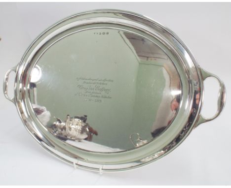1920's hallmarked silver oval twin handled tray Birmingham hallmarks 1925 with presentation inscription dated 1927 weight app
