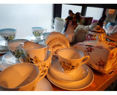 Shelf of mixed ceramics