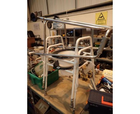 Disability aids one walking frame and two commode frames with seats unused 