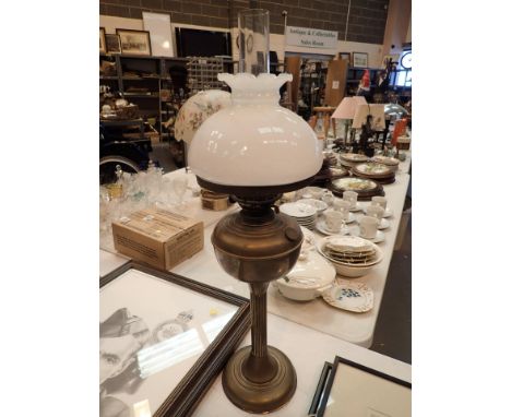 Brass columnar paraffin lamp with shade and chimney
