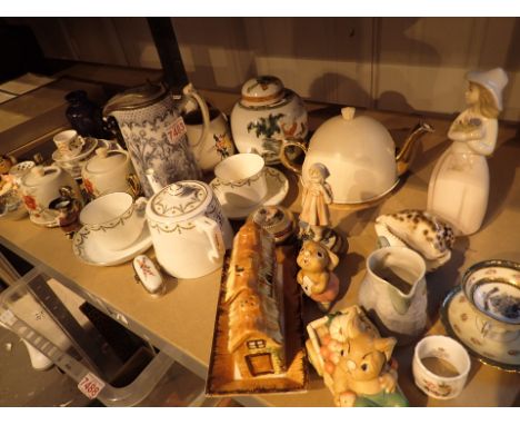 Shelf of mixed ceramics